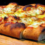 Melted Magic: The Irresistible Cheesy Garlic Bread Pizza
